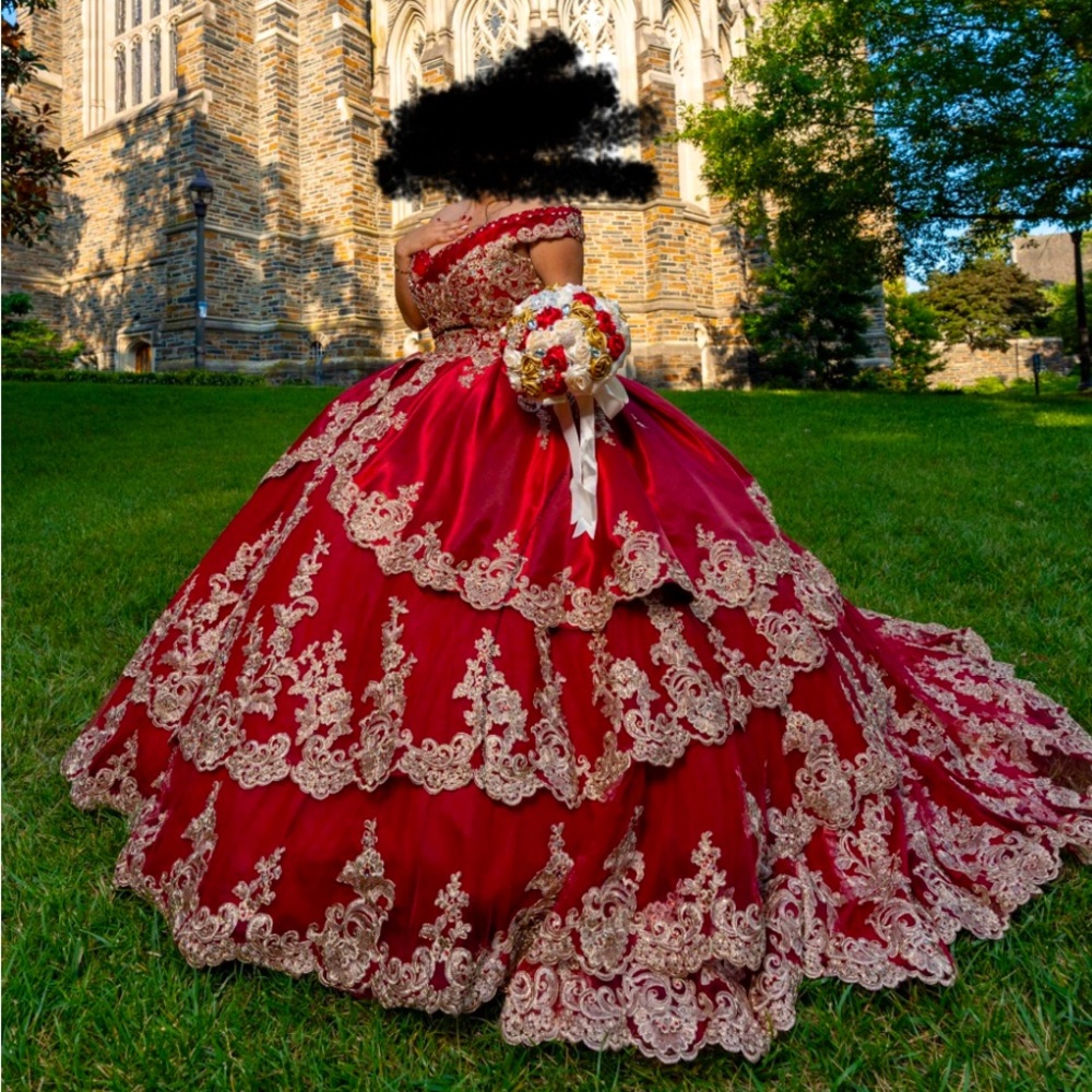 Elegant Red Gown with Intricate Lace
